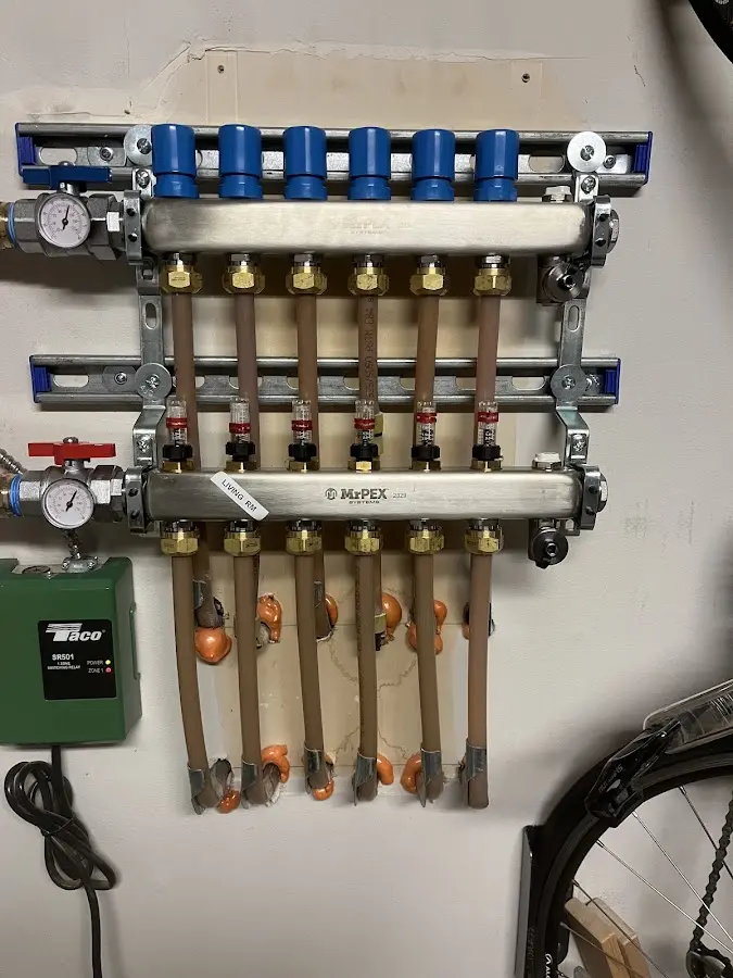 Plumber performing Leak Detection at a residential property in Forks